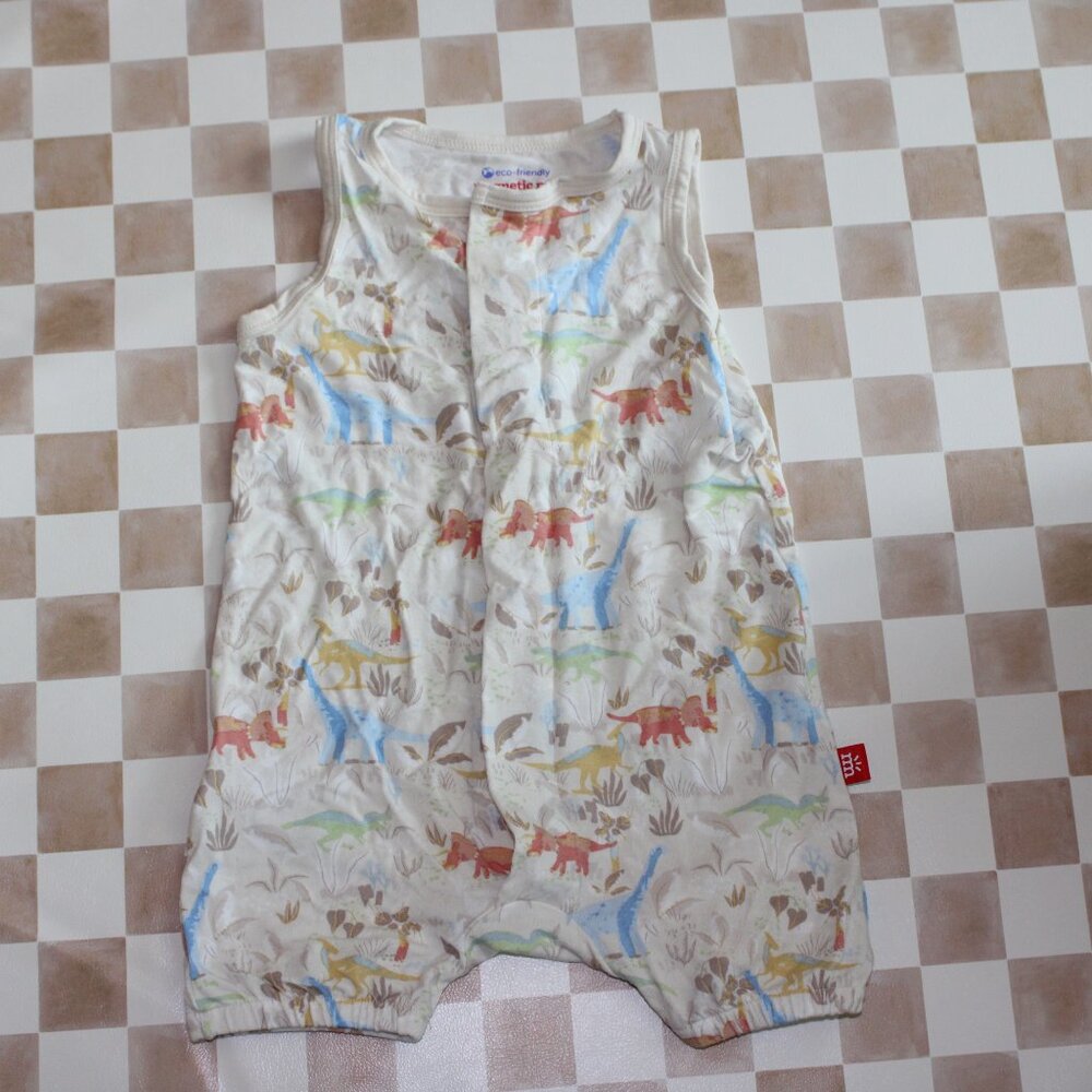 Magnetic Me Cream Romper with Blue, Green, Yellow, and Red Dino Print